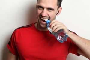 Man Opens Water Bottle using Teeth
