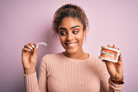 Young Woman with Clear Aligners